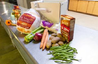 Community Food Bank produce and groceries distributed to families